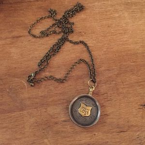 Waxing poetic charm necklace