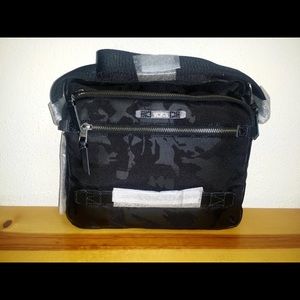 Tumi crossbody messenger bag