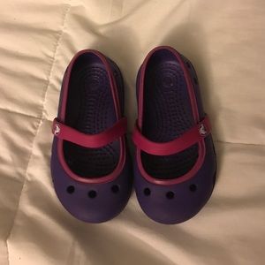 Pink and purple crocs