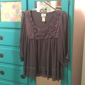 Grey flowy top with flower details
