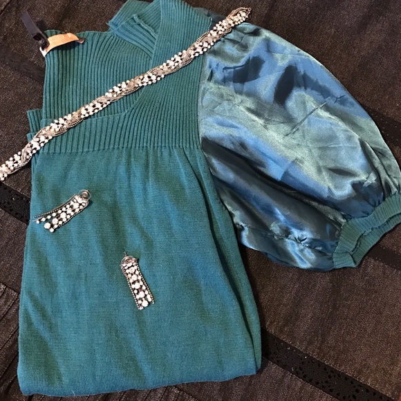 Teal colored top with puff sleeves