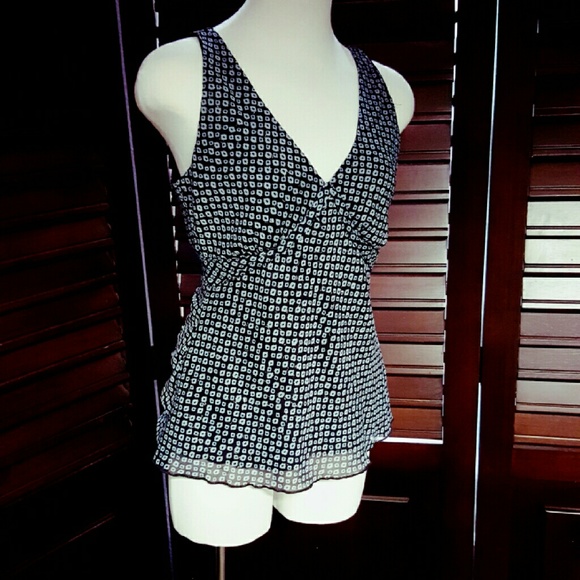 Sleeveless blue black and gold patterned top