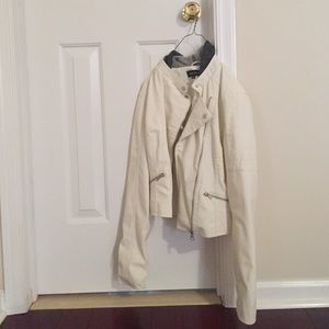 White faux leather jacket with hoodie.