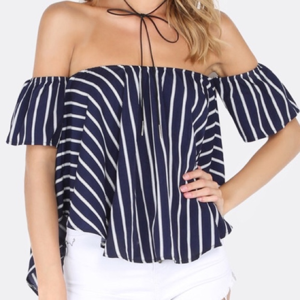 Stripped off the shoulder top.