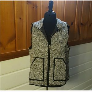 New, herringbone puffer vest. Made in USA