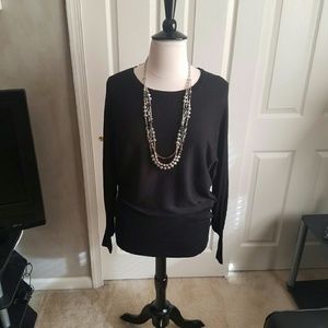 Black dolman sleeve sweater.