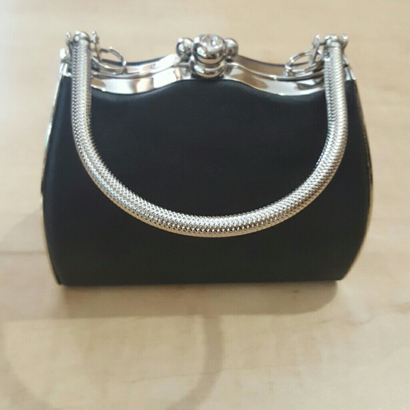 NWOT Black and silver formal evening bag.