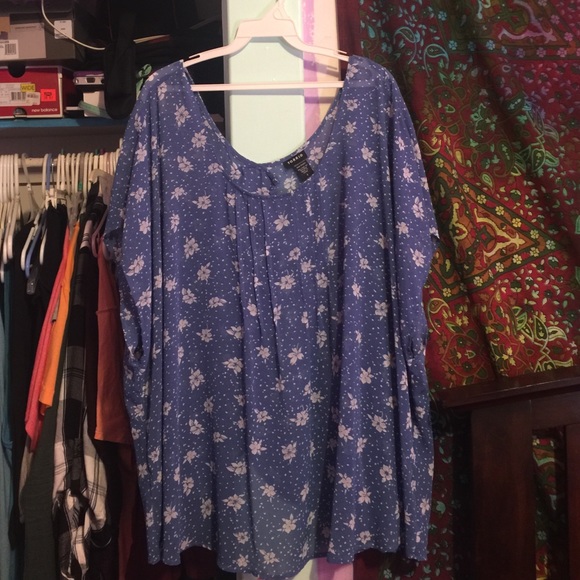 Open back blue shirt