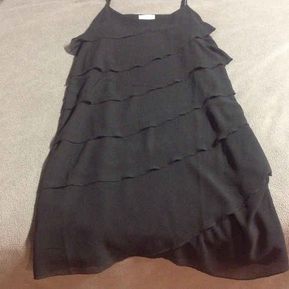 Black ruffled cancan styled dress.