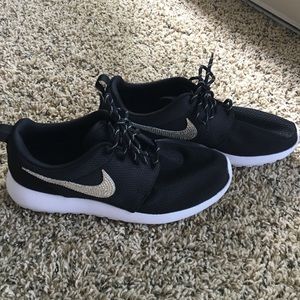 Black Nikes with crystal swoops