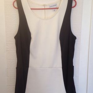 Black and white sleeveless peplum