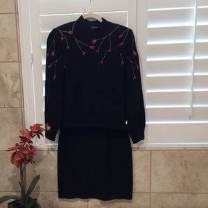 Black St John sweater and matching skirt