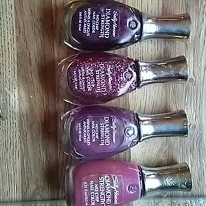 4 bottles sally  Hansen diamond strength nail poli