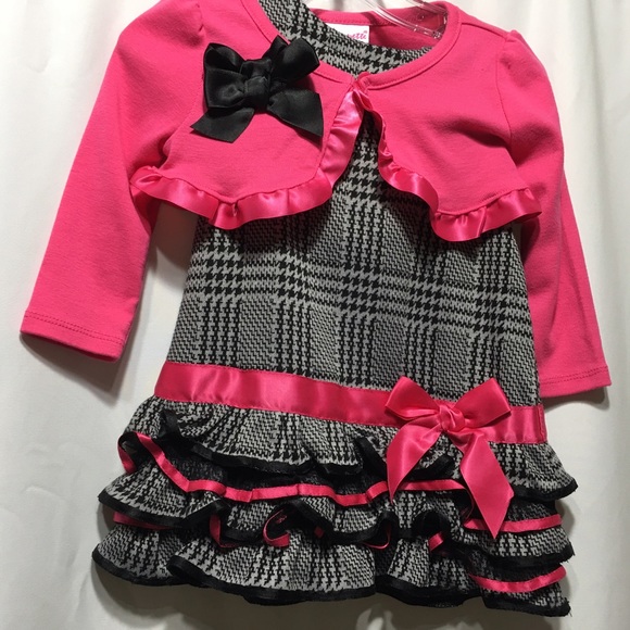Infant pink plaid dress with ruffles with bows