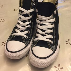 Black and white high top converse