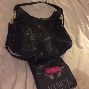 A black, leather, Riley Hobo, Vince Camuto purse.