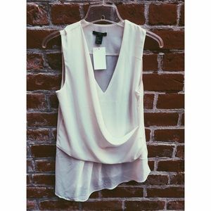 White no sleeve blouse