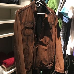 Brown leather coat with a pretty slim fit.
