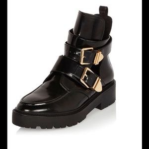 Black patent cut-out boots