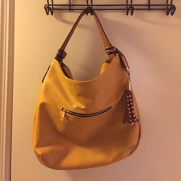 Beautiful harvest gold hobo bag NWOT brown trim