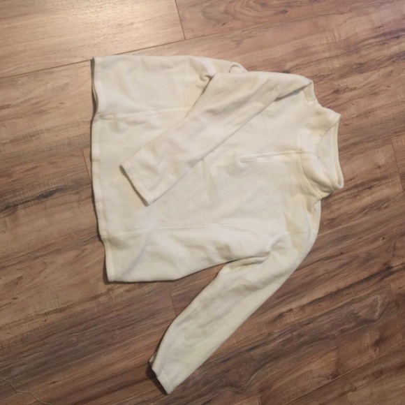 100% polyester off white sweater