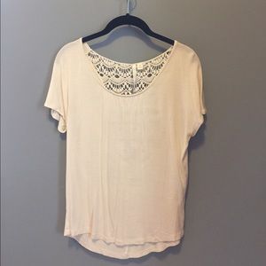 Lauren Conrad cream colored shirt