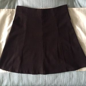 Twenty-one knee-length A-line skirt. Brown.