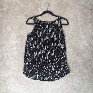 Chevron printed top in black. 100% rayon. Size sm