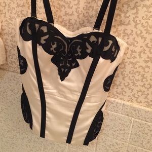 Bebe top cream color with black design size small