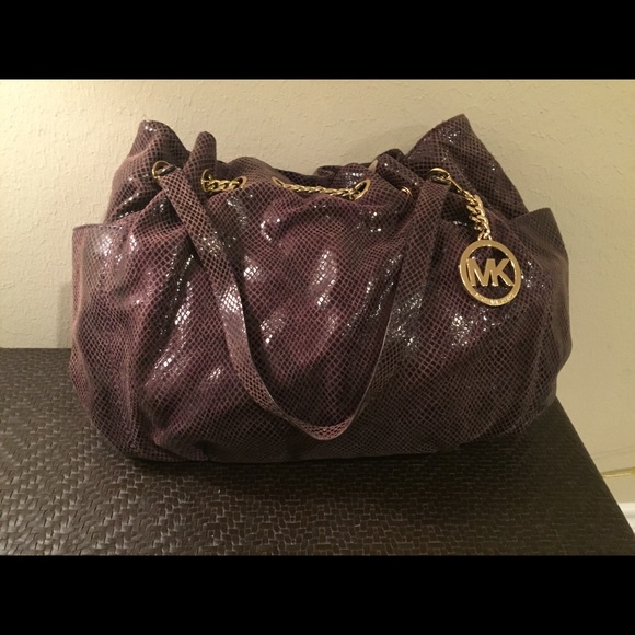 Purple Michael Kors purse - like new