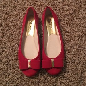 Red Michael Kors flats.