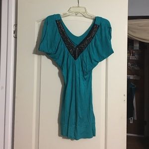 Turquoise tunic with sparkly Black V-neck front