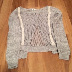Grey and white knitted sweater