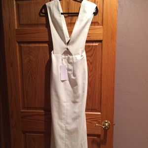 White dress NTW small mark as noted in pic.