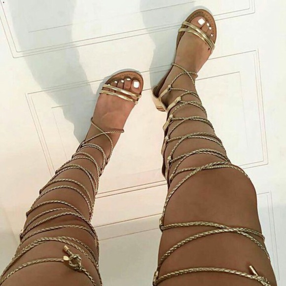 Metallic gold lace up thigh high gladiator sandal