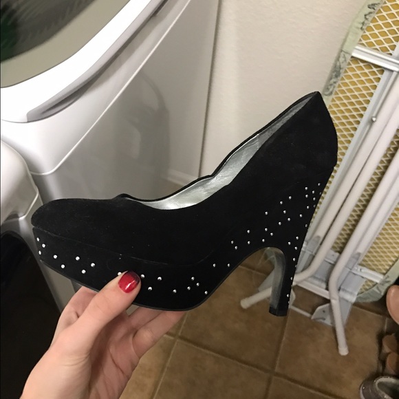 Black heels with silver sparkles.