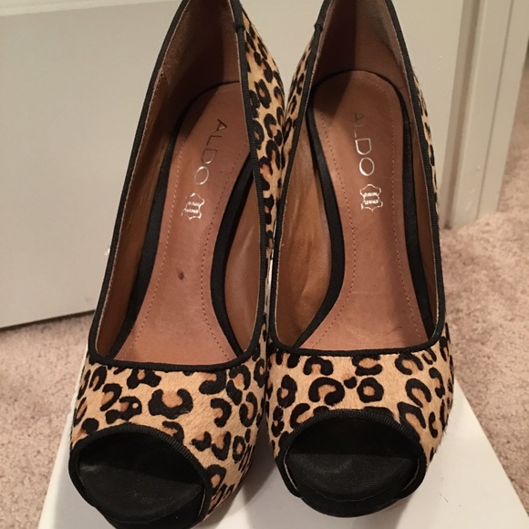 Leopard print peep toe pumps