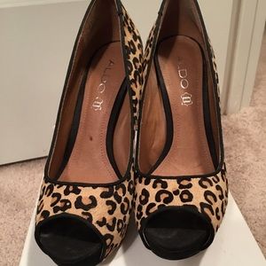 Leopard print peep toe pumps