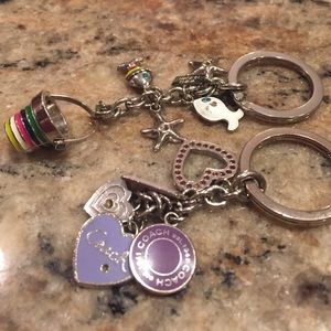 Two Coach keychains