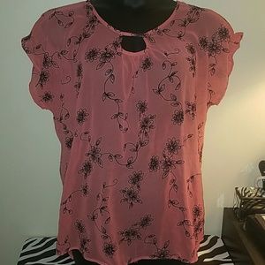 Sheer blouse with black flower design