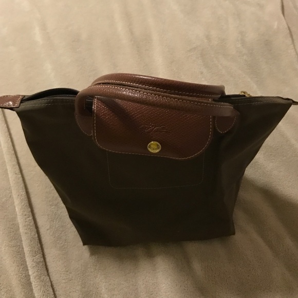 Mini longchamp purse in brown- never used
