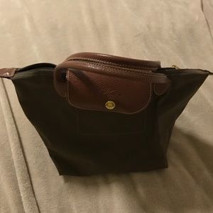 Mini longchamp purse in brown- never used