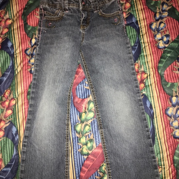 Dark wash girls jeans.
