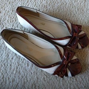 White canvas/brown leather peep toe flats. NARROW
