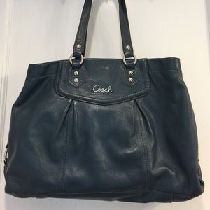Coach handbag with matching wallet.