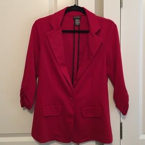 Red blazer.