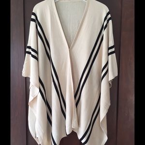 V-neck irregular hem knitted cape