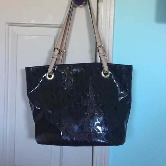 Michael Kors back and tan bag