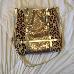 Gold leopard IMAN bag, never used