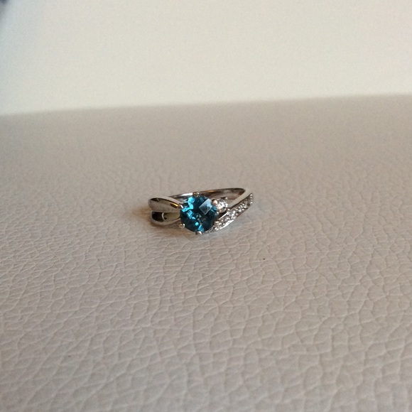 Silver 925 ring with blue topaz. Size 6